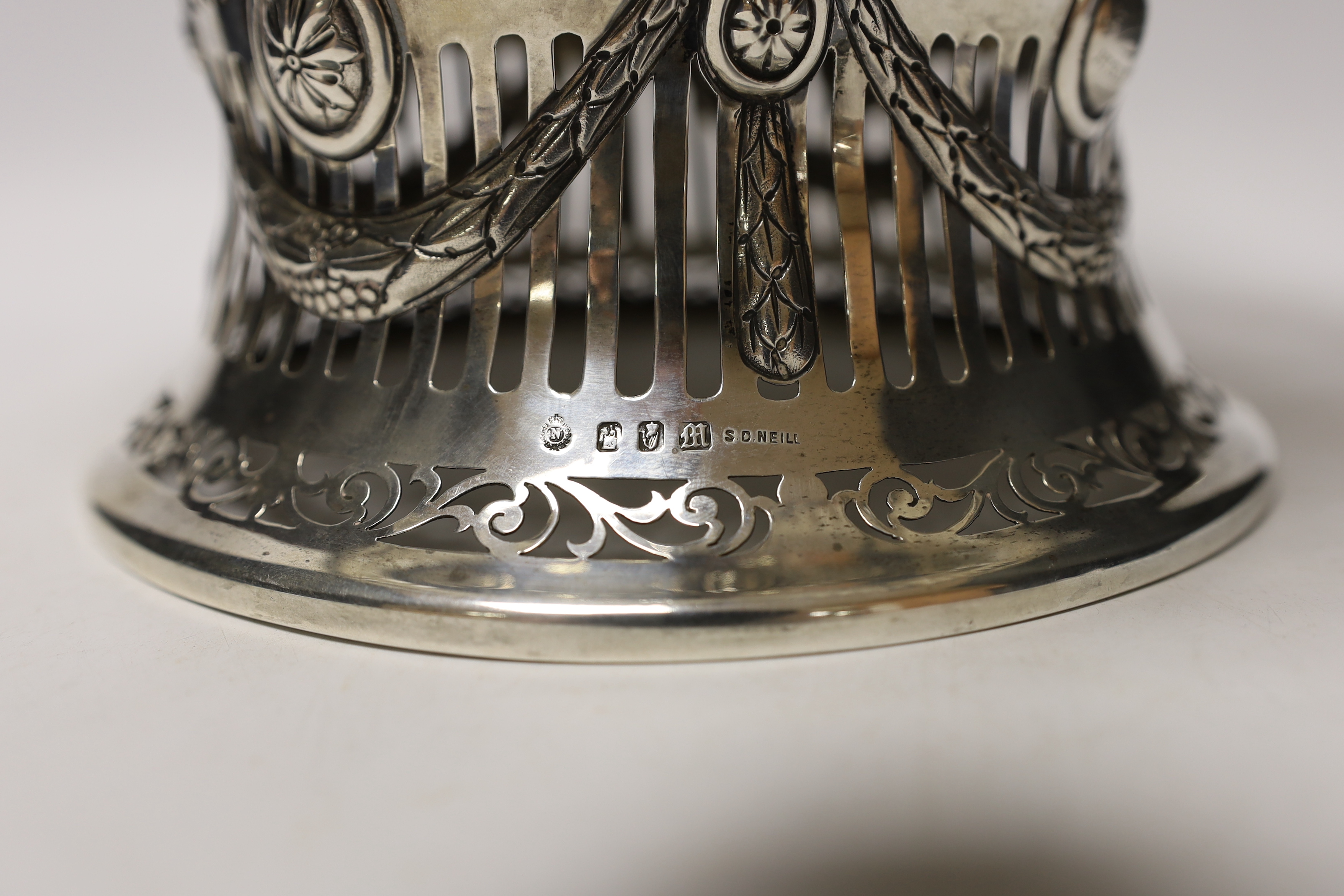 An Edwardian Irish silver dish ring and dish by Sharman D. Neil, Dublin, 1907/1908, dish diameter 25.9cm (a.f.), 26oz.